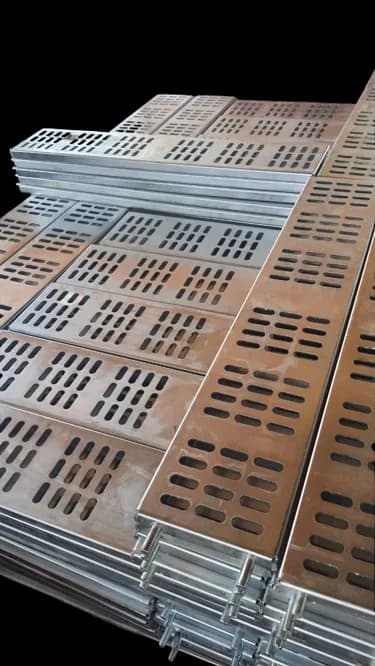 Stacked galvanised steel slotted panels