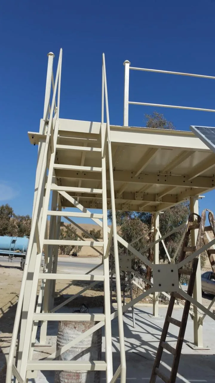 Steel access platform with staircase and handrails