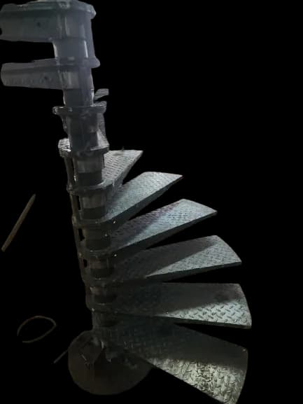 Steel spiral staircase with chequer-plate treads
