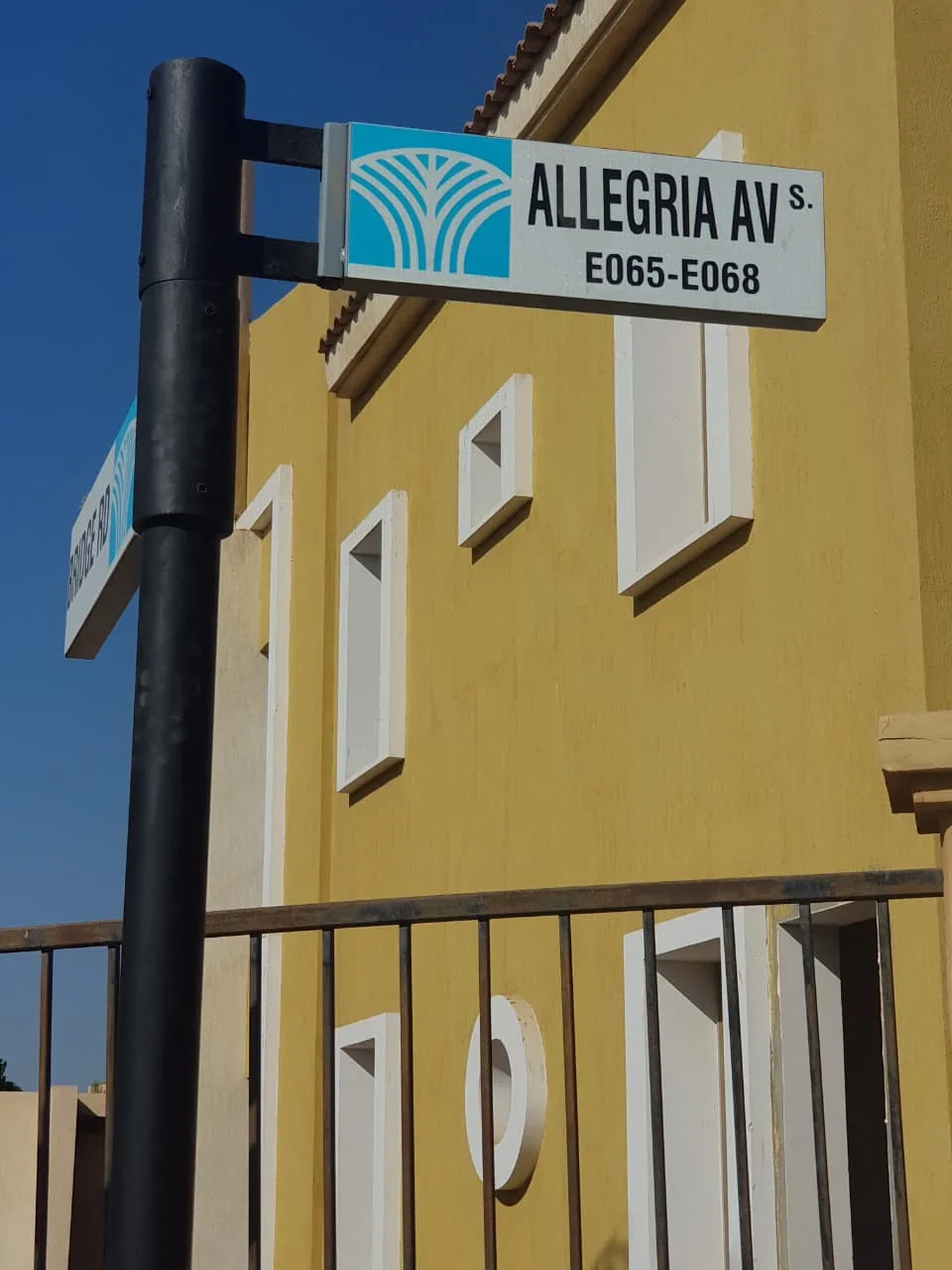 Al Aman street name signage installed at Allegria, Sheikh Zayed